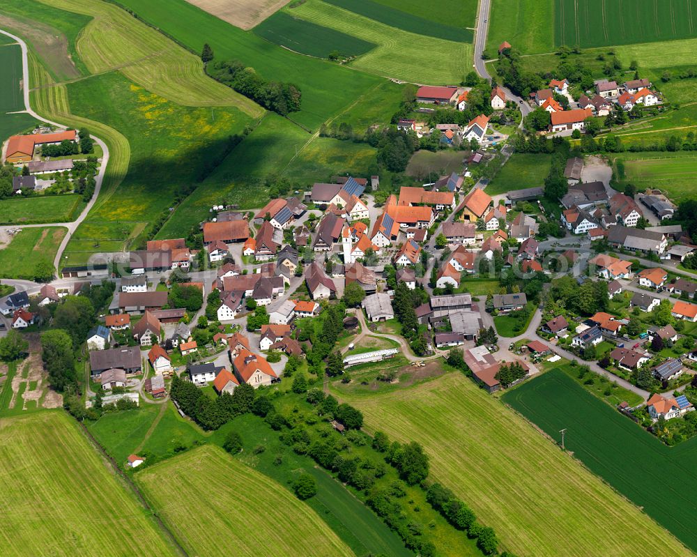 Aerial photograph Dürnau - Agricultural land and field boundaries surround the settlement area of the village in Dürnau in the state Baden-Wuerttemberg, Germany