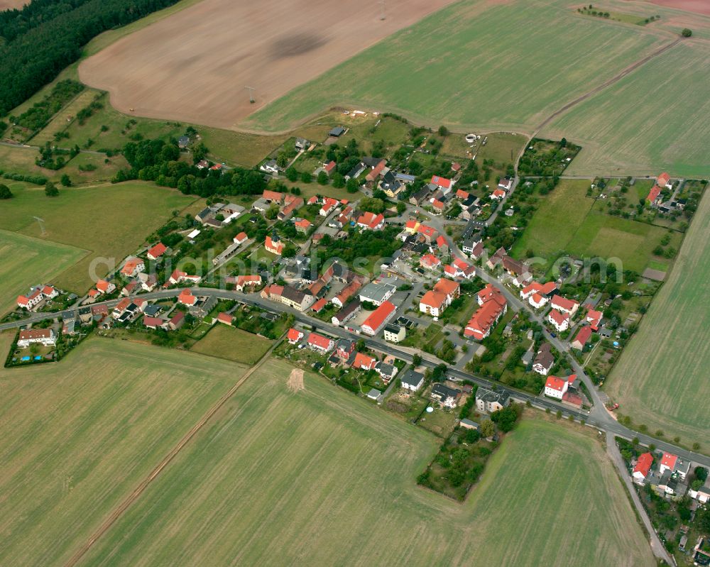 Aerial image Dürrenebersdorf - Agricultural land and field boundaries surround the settlement area of the village in Dürrenebersdorf in the state Thuringia, Germany