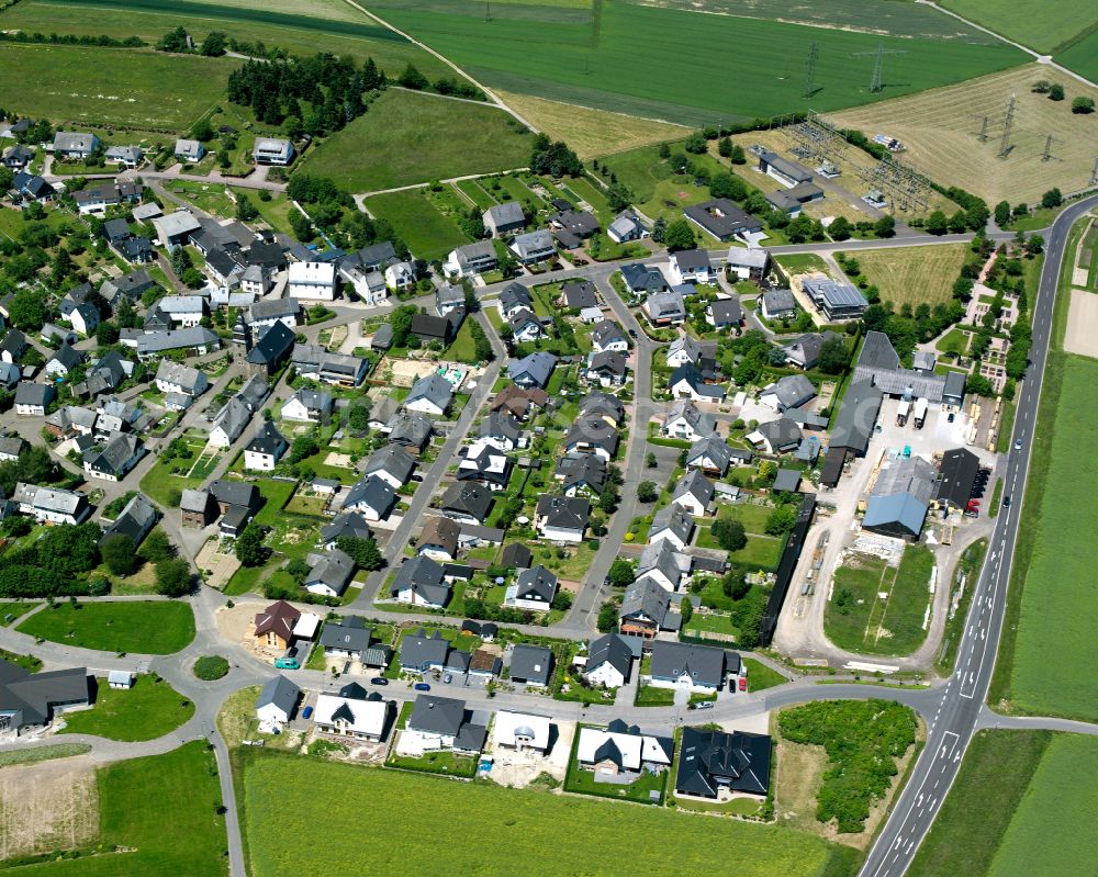 Dörth from above - Agricultural land and field boundaries surround the settlement area of the village in Dörth in the state Rhineland-Palatinate, Germany