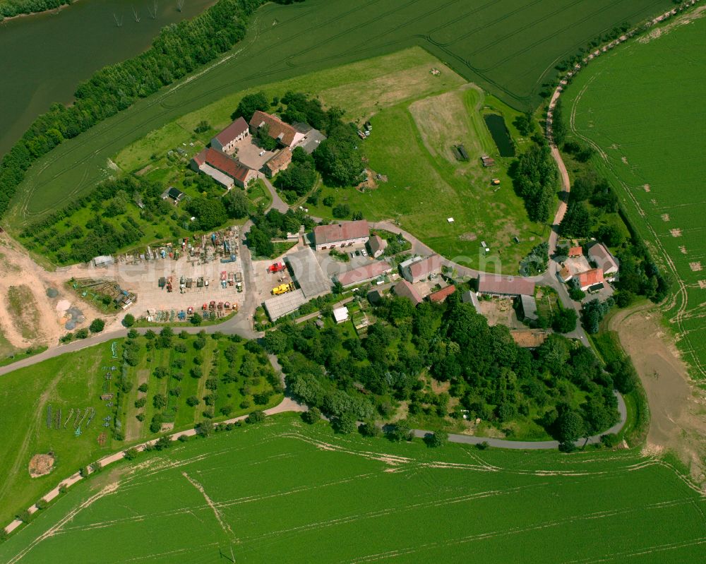 Dösitz from above - Agricultural land and field boundaries surround the settlement area of the village in Dösitz in the state Saxony, Germany