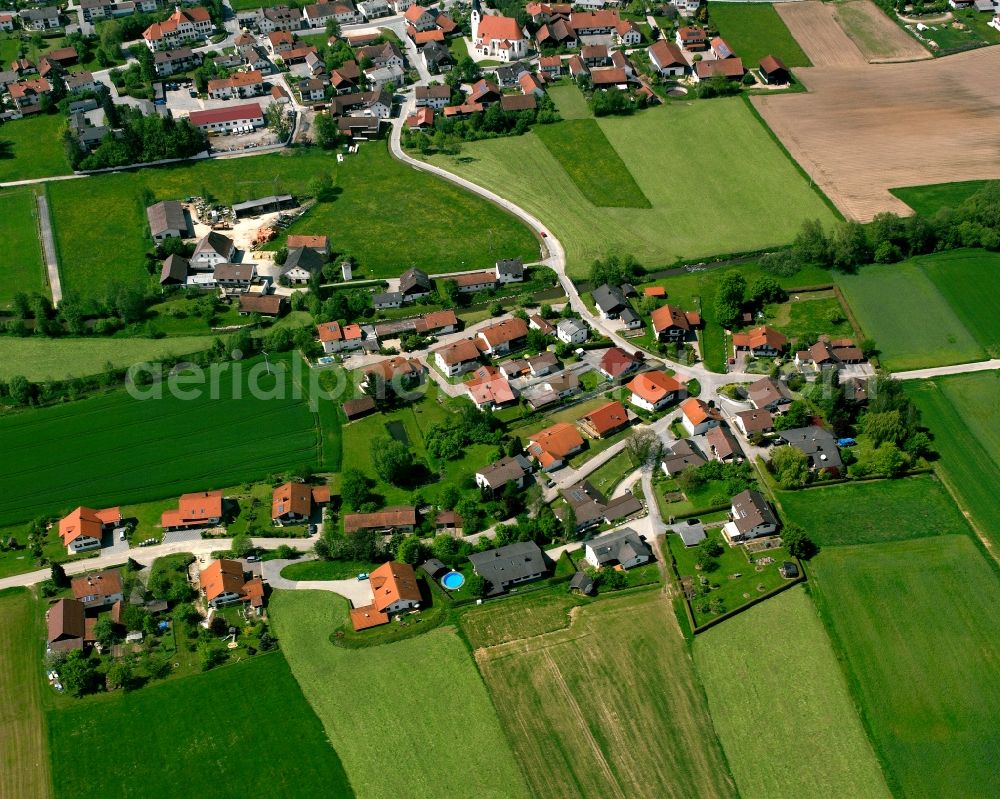 Aerial image Dummeldorf - Agricultural land and field boundaries surround the settlement area of the village in Dummeldorf in the state Bavaria, Germany