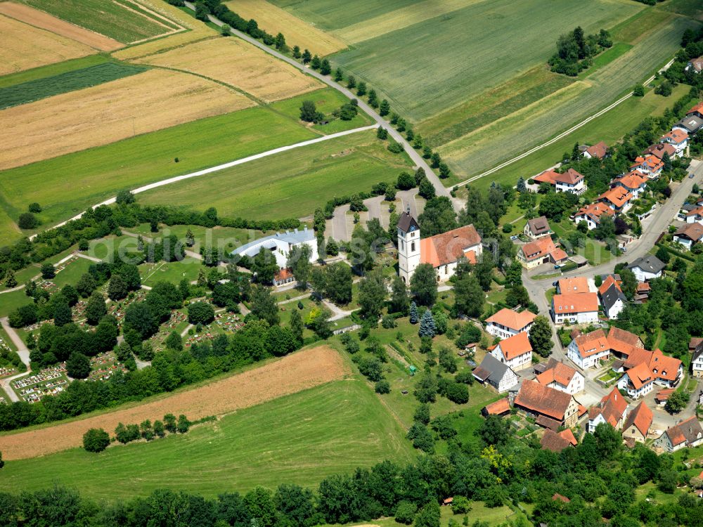 Aerial image Dußlingen - Agricultural land and field boundaries surround the settlement area of the village in Dußlingen in the state Baden-Wuerttemberg, Germany