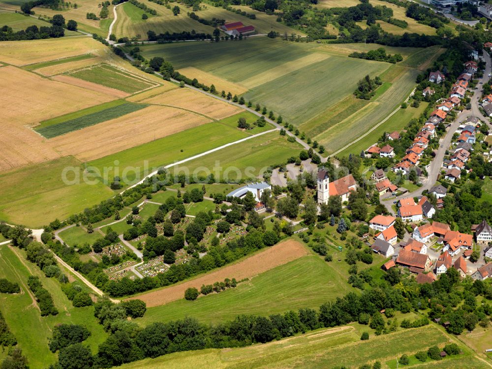 Aerial photograph Dußlingen - Agricultural land and field boundaries surround the settlement area of the village in Dußlingen in the state Baden-Wuerttemberg, Germany