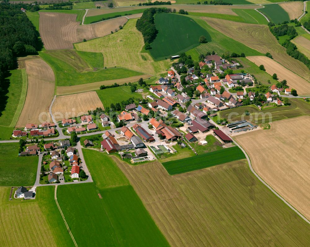 Aerial image Edenbachen - Agricultural land and field boundaries surround the settlement area of the village in Edenbachen in the state Baden-Wuerttemberg, Germany