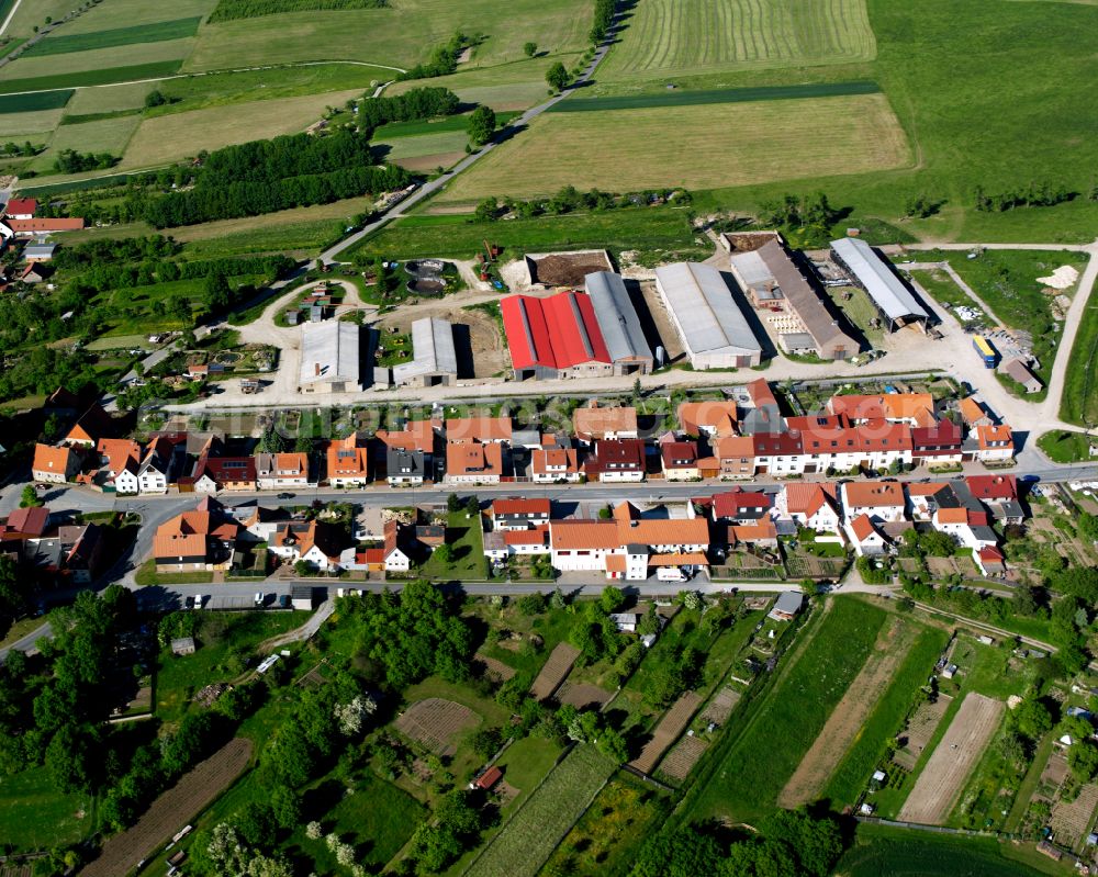 Aerial image Effelder - Agricultural land and field boundaries surround the settlement area of the village in Effelder in the state Thuringia, Germany