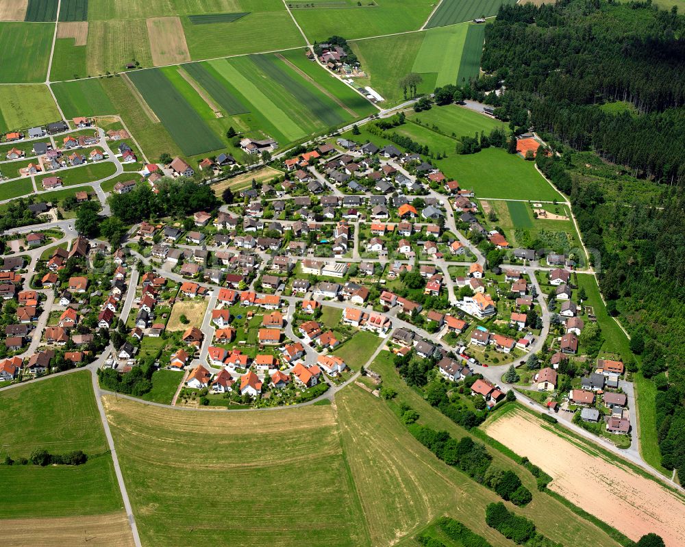 Egenhausen from above - Agricultural land and field boundaries surround the settlement area of the village in Egenhausen in the state Baden-Wuerttemberg, Germany