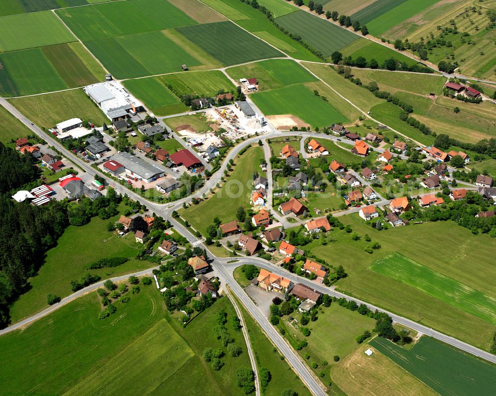 Egenhausen from the bird's eye view: Agricultural land and field boundaries surround the settlement area of the village in Egenhausen in the state Baden-Wuerttemberg, Germany