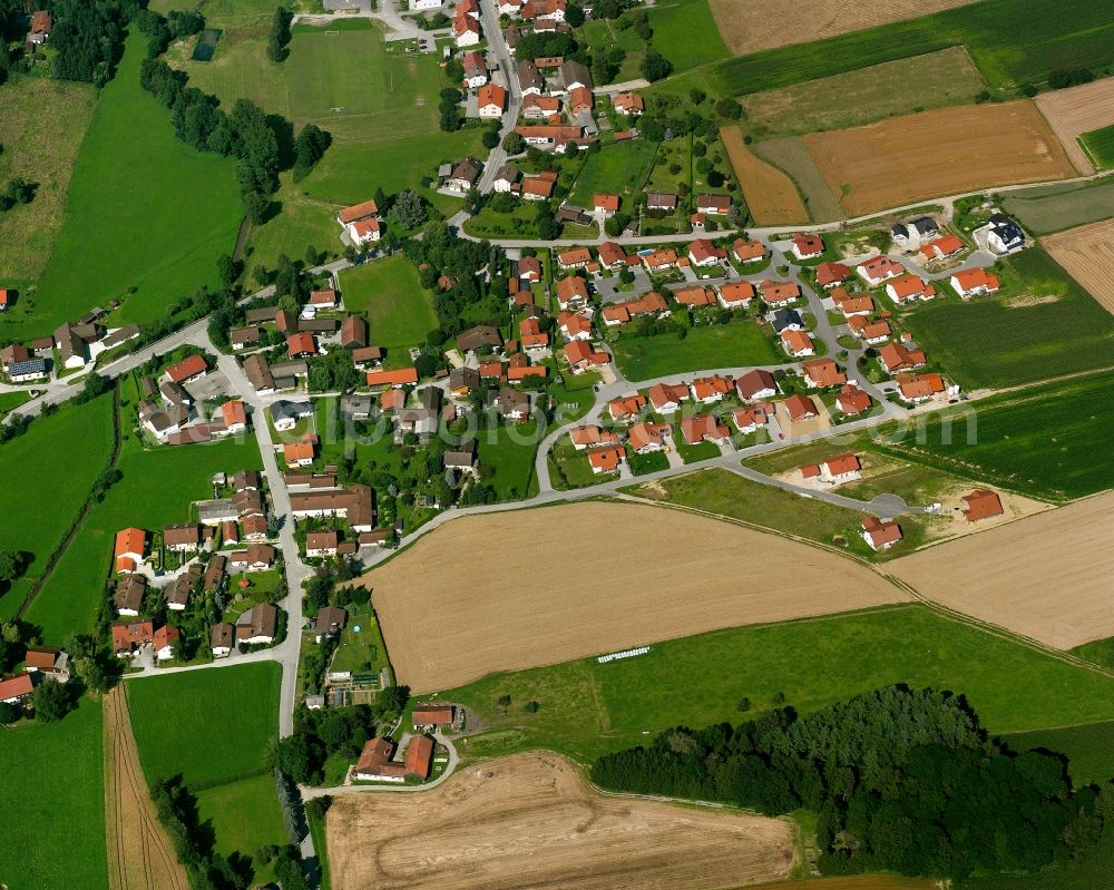 Aerial image Egglham - Agricultural land and field boundaries surround the settlement area of the village in Egglham in the state Bavaria, Germany