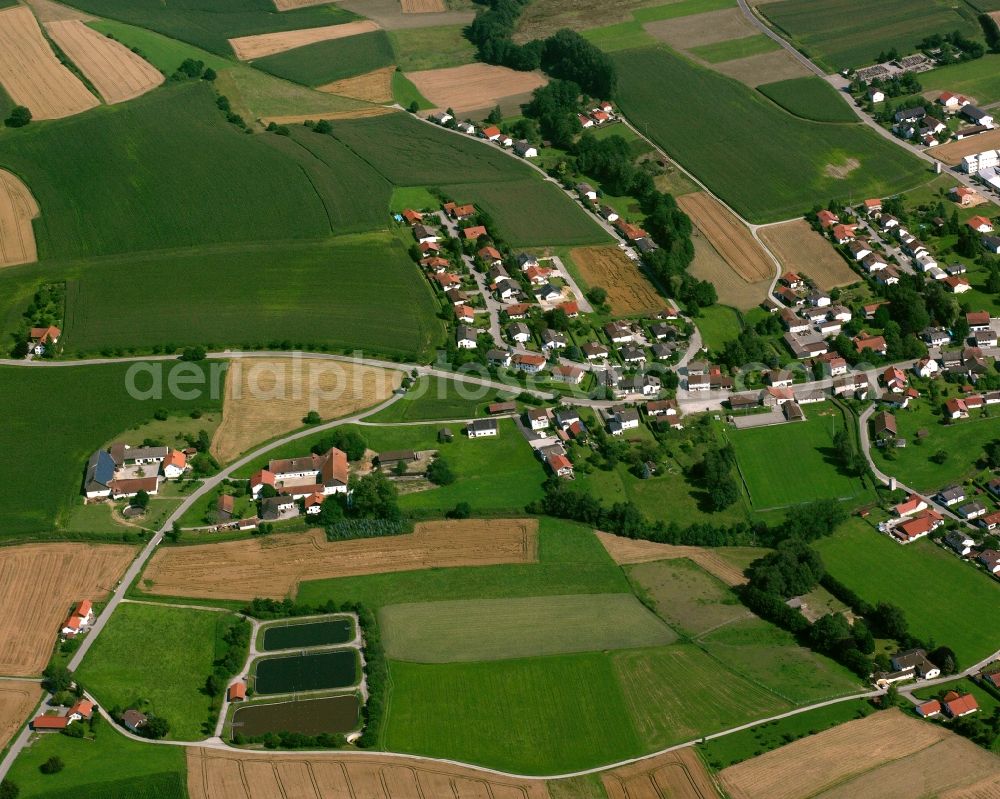 Egglham from above - Agricultural land and field boundaries surround the settlement area of the village in Egglham in the state Bavaria, Germany