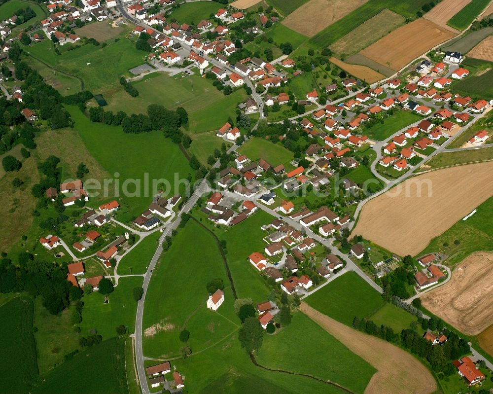 Egglham from the bird's eye view: Agricultural land and field boundaries surround the settlement area of the village in Egglham in the state Bavaria, Germany