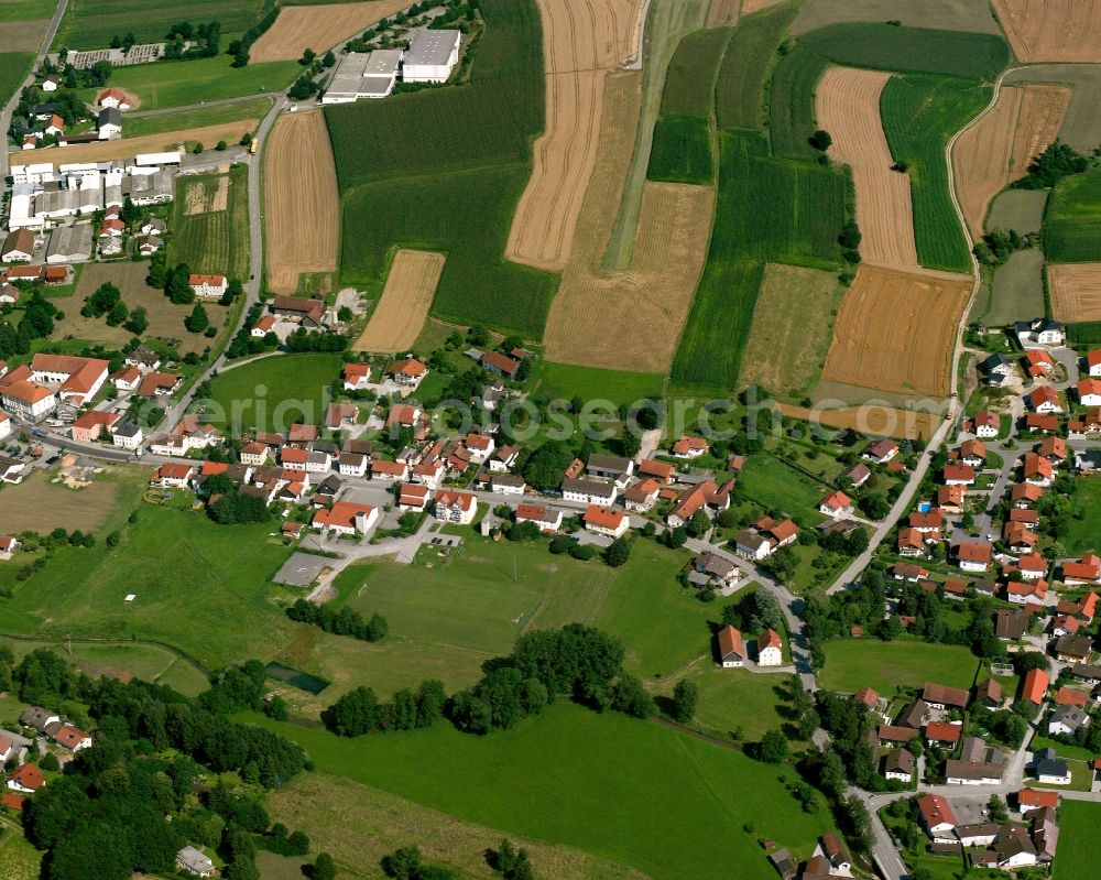 Aerial image Egglham - Agricultural land and field boundaries surround the settlement area of the village in Egglham in the state Bavaria, Germany