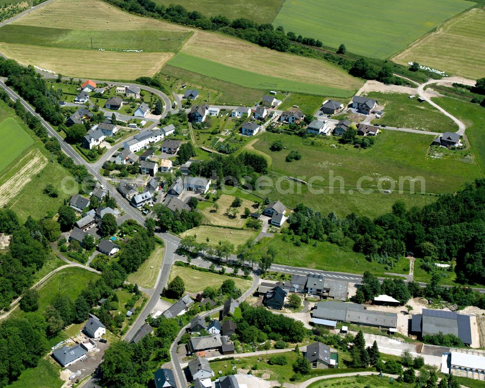 Aerial image Ehr - Agricultural land and field boundaries surround the settlement area of the village in Ehr in the state Rhineland-Palatinate, Germany