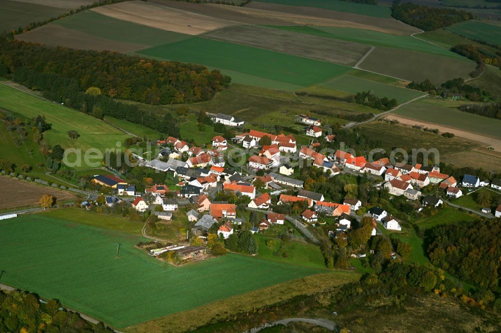 Aerial photograph Ehweiler - Agricultural land and field boundaries surround the settlement area of the village in Ehweiler in the state Rhineland-Palatinate, Germany