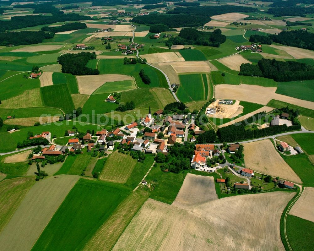 Eiberg from the bird's eye view: Agricultural land and field boundaries surround the settlement area of the village in Eiberg in the state Bavaria, Germany