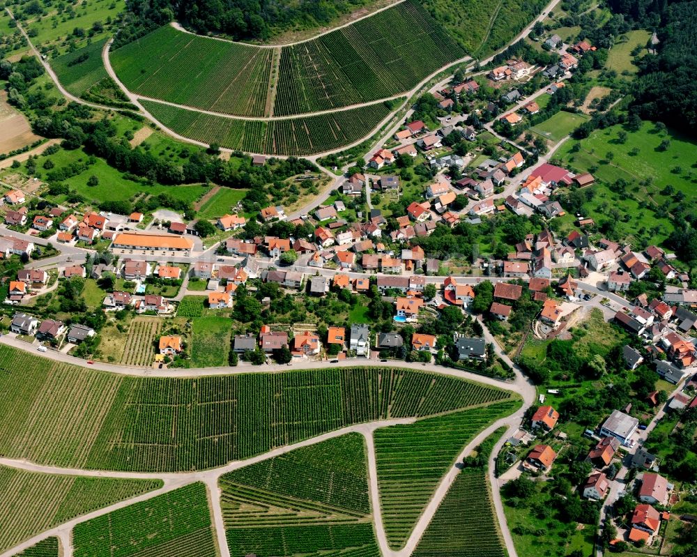 Aerial image Eichelberg - Agricultural land and field boundaries surround the settlement area of the village in Eichelberg in the state Baden-Wuerttemberg, Germany