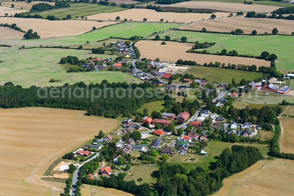 Aerial image Eilsdorf - Agricultural land and field boundaries surround the settlement area of the village in Eilsdorf in the state Schleswig-Holstein, Germany