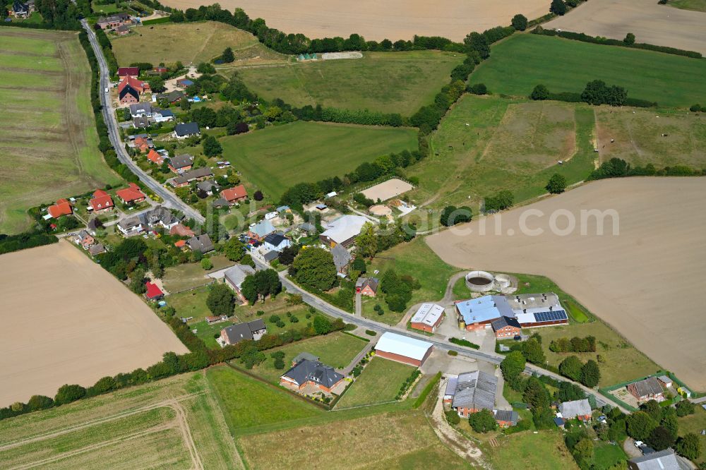 Aerial image Eilsdorf - Agricultural land and field boundaries surround the settlement area of the village in Eilsdorf in the state Schleswig-Holstein, Germany