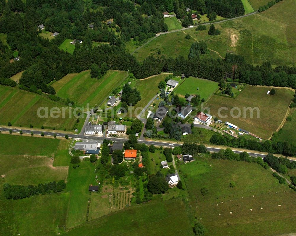 Aerial photograph Einschiederhof - Agricultural land and field boundaries surround the settlement area of the village in Einschiederhof in the state Rhineland-Palatinate, Germany