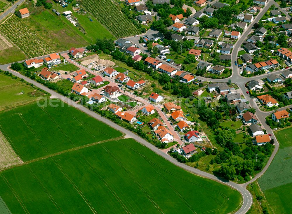 Einselthum from above - Agricultural land and field boundaries surround the settlement area of the village in Einselthum in the state Rhineland-Palatinate, Germany