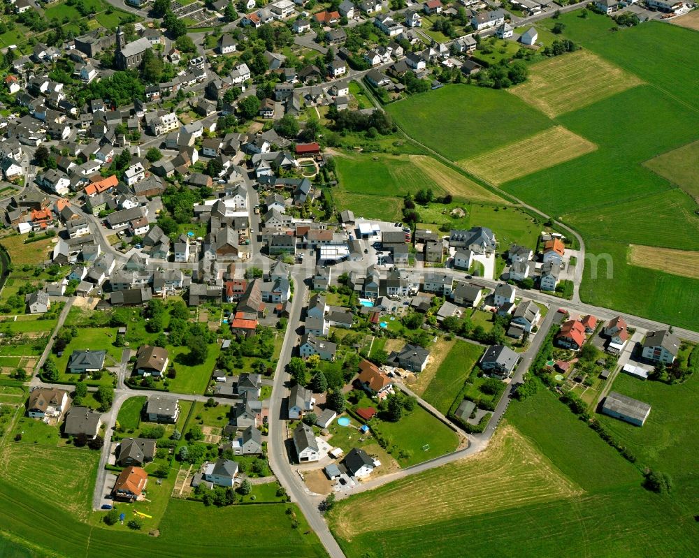 Ellar from the bird's eye view: Agricultural land and field boundaries surround the settlement area of the village in Ellar in the state Hesse, Germany