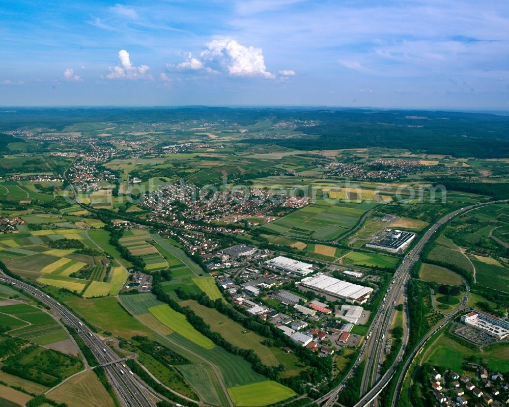 Aerial photograph Ellhofen - Agricultural land and field boundaries surround the settlement area of the village in Ellhofen in the state Baden-Wuerttemberg, Germany