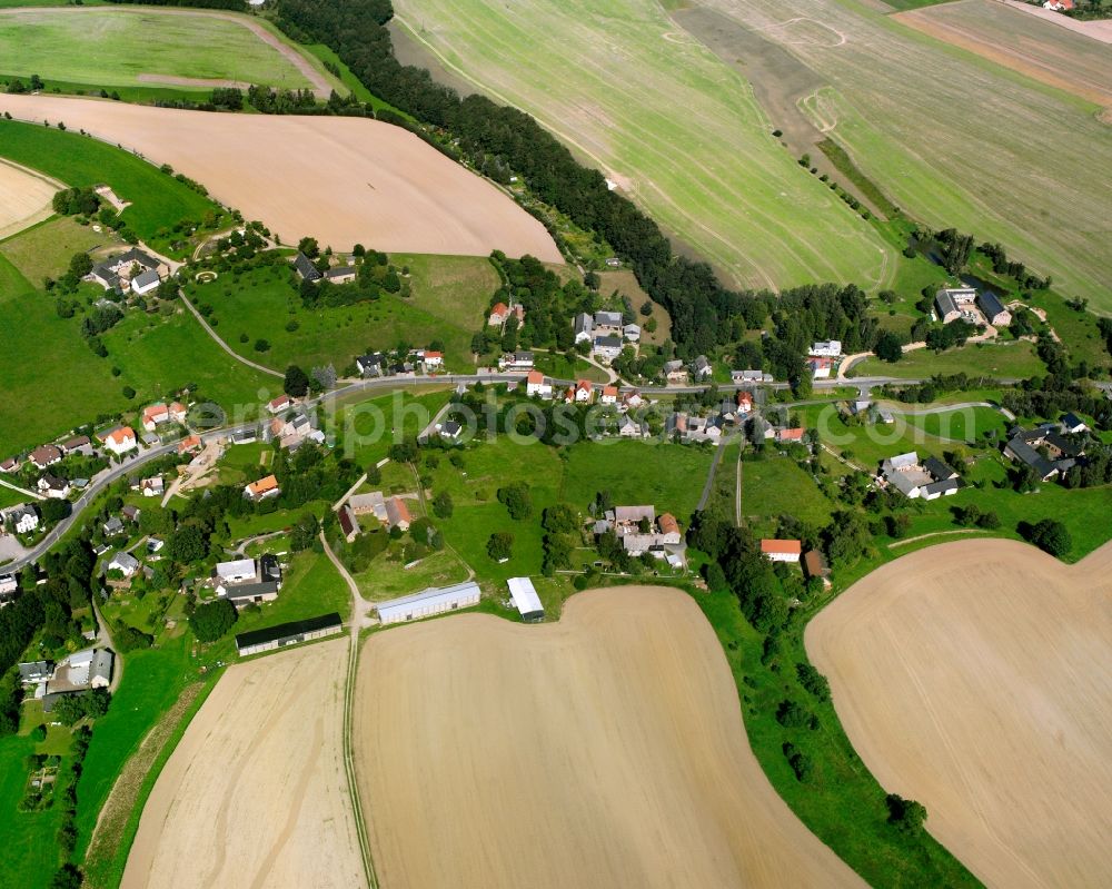 Elsdorf from above - Agricultural land and field boundaries surround the settlement area of the village in Elsdorf in the state Saxony, Germany