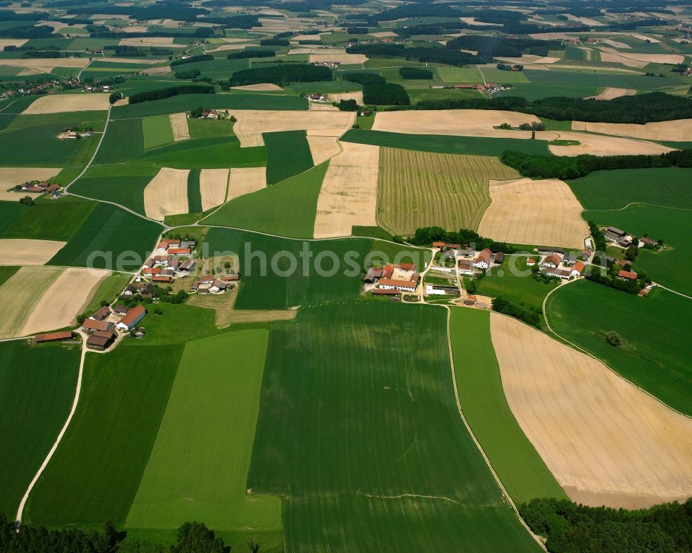 Aerial image Engersdorf - Agricultural land and field boundaries surround the settlement area of the village in Engersdorf in the state Bavaria, Germany