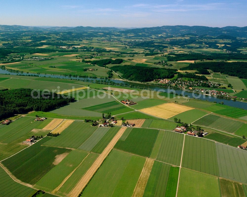 Aerial image Entau - Agricultural land and field boundaries surround the settlement area of the village in Entau in the state Bavaria, Germany