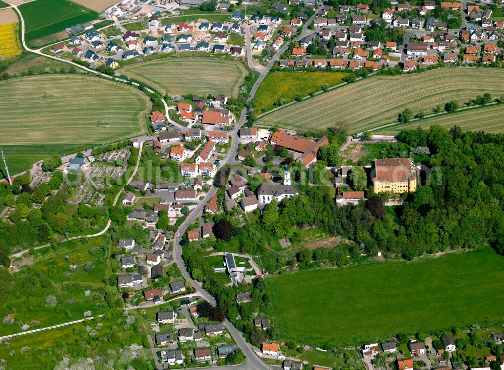 Erbach from above - Agricultural land and field boundaries surround the settlement area of the village in Erbach in the state Baden-Wuerttemberg, Germany