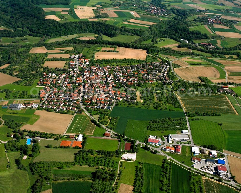 Aerial image Erbstetten - Agricultural land and field boundaries surround the settlement area of the village in Erbstetten in the state Baden-Wuerttemberg, Germany