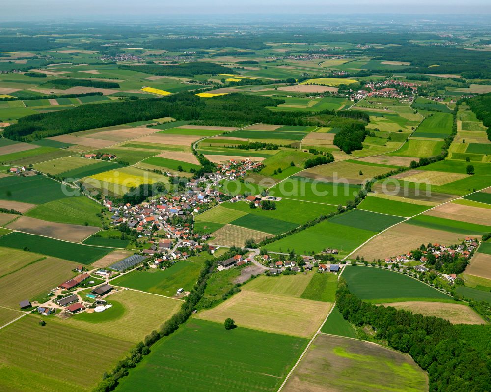 Aerial photograph Erolzheim - Agricultural land and field boundaries surround the settlement area of the village in Erolzheim in the state Baden-Wuerttemberg, Germany