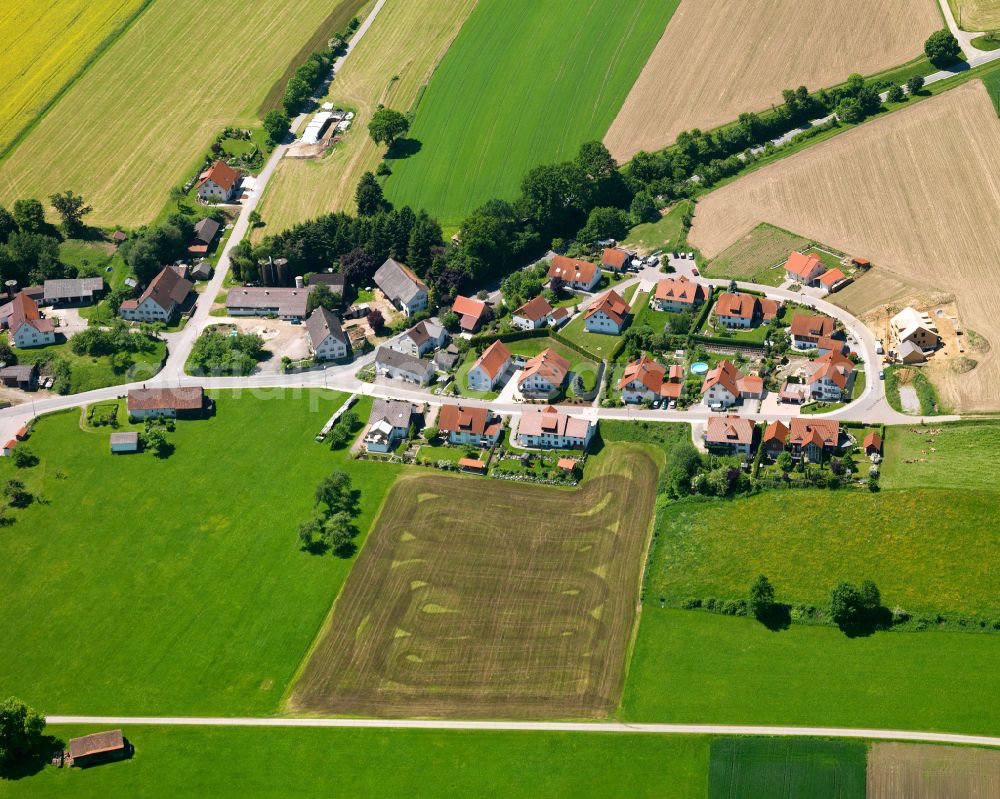 Erolzheim from the bird's eye view: Agricultural land and field boundaries surround the settlement area of the village in Erolzheim in the state Baden-Wuerttemberg, Germany