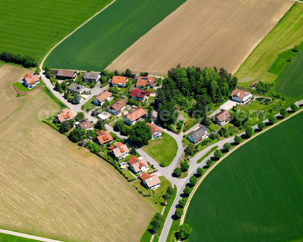 Aerial photograph Erolzheim - Agricultural land and field boundaries surround the settlement area of the village in Erolzheim in the state Baden-Wuerttemberg, Germany