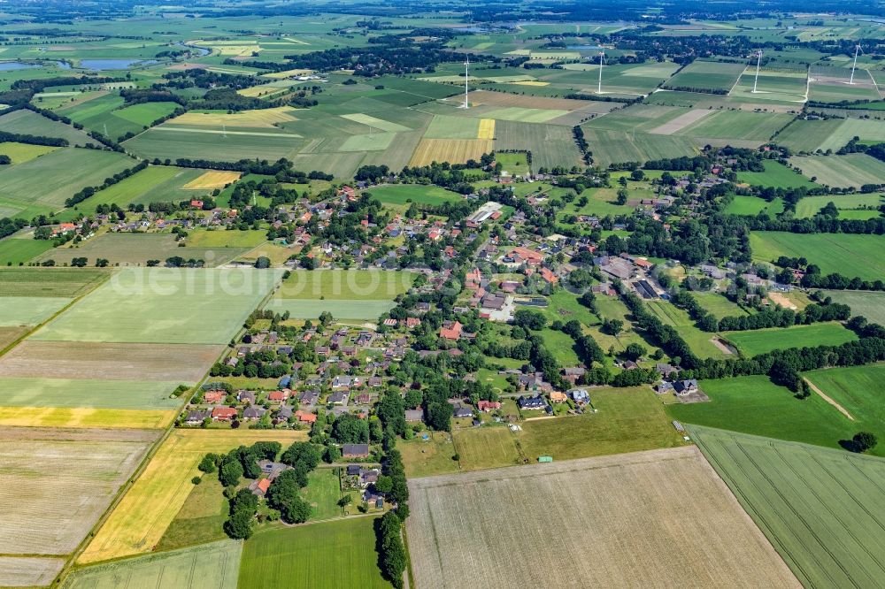 Aerial image Estorf - Agricultural land and field boundaries surround the settlement area of a??a??the village in Estorf in the state Lower Saxony, Germany