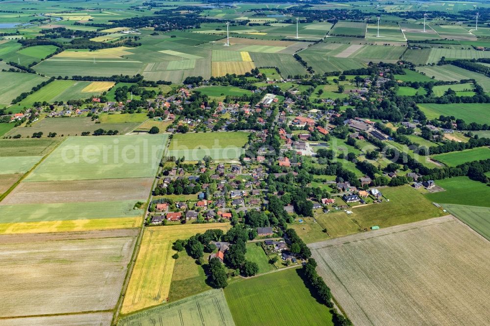 Aerial photograph Estorf - Agricultural land and field boundaries surround the settlement area of a??a??the village in Estorf in the state Lower Saxony, Germany