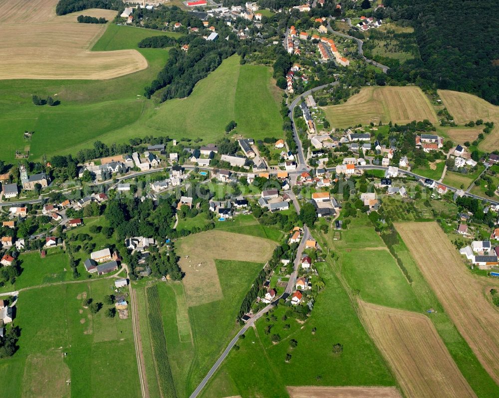 Aerial image Etzdorf - Agricultural land and field boundaries surround the settlement area of the village in Etzdorf in the state Saxony, Germany