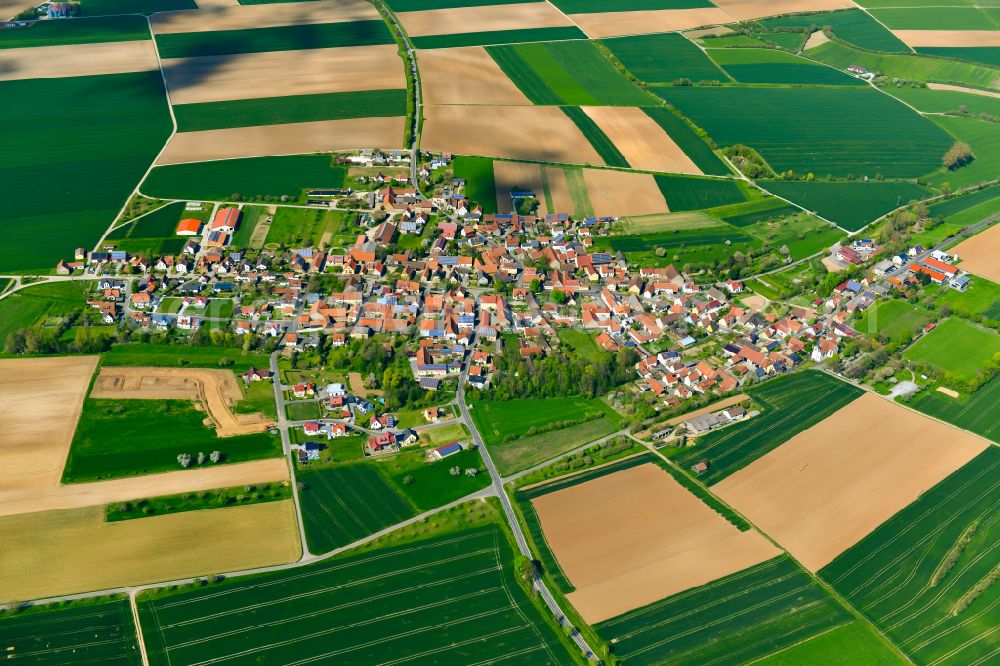 Aerial image Euerfeld - Agricultural land and field boundaries surround the settlement area of the village in Euerfeld in the state Bavaria, Germany