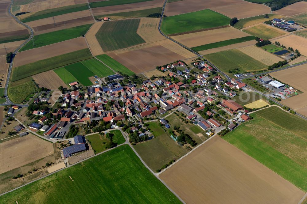 Aerial image Euerhausen - Agricultural land and field boundaries surround the settlement area of the village in Euerhausen in the state Bavaria, Germany