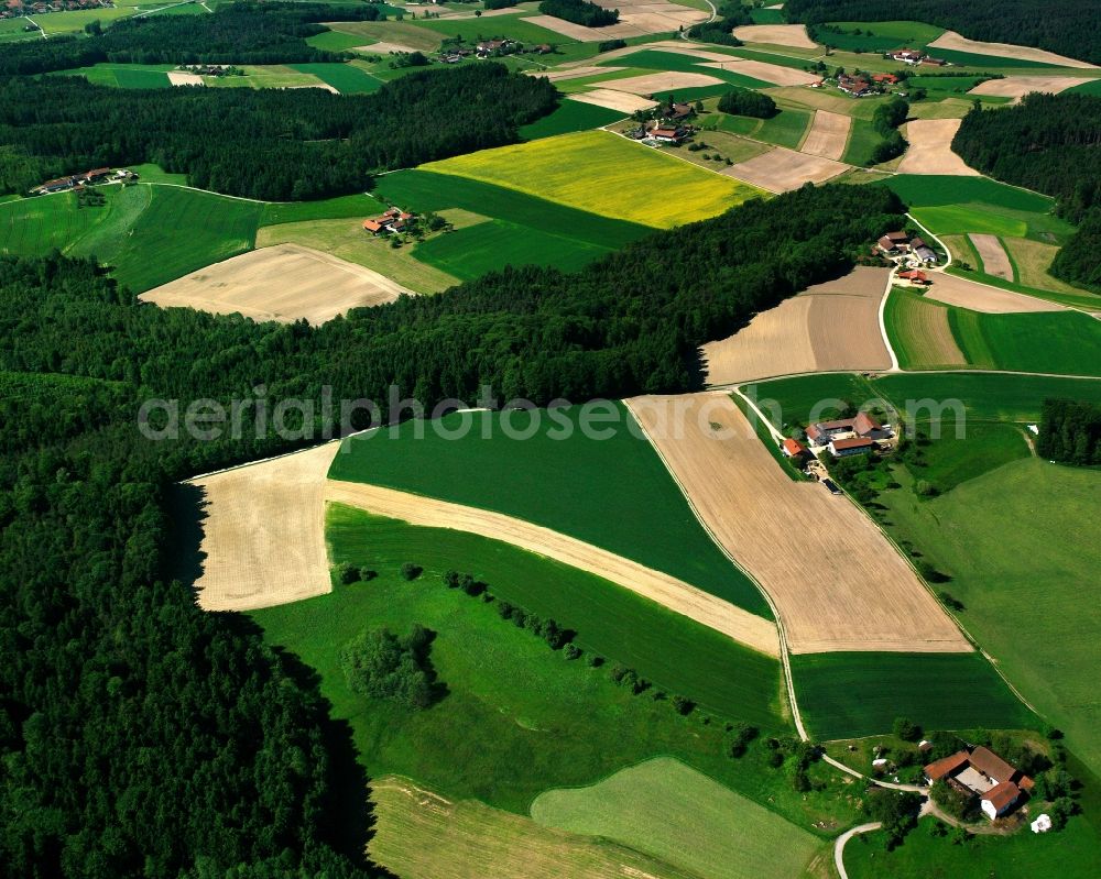 Aerial image Faberöd - Agricultural land and field boundaries surround the settlement area of the village in Faberöd in the state Bavaria, Germany