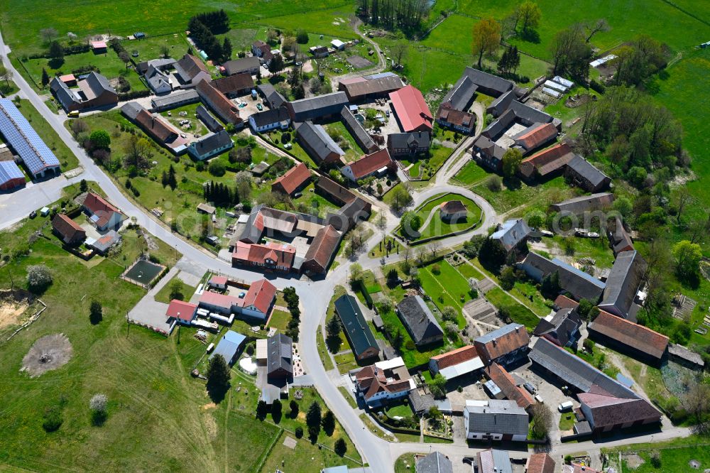 Fahrendorf from above - Agricultural land and field boundaries surround the settlement area of the village in Fahrendorf in the state Saxony-Anhalt, Germany