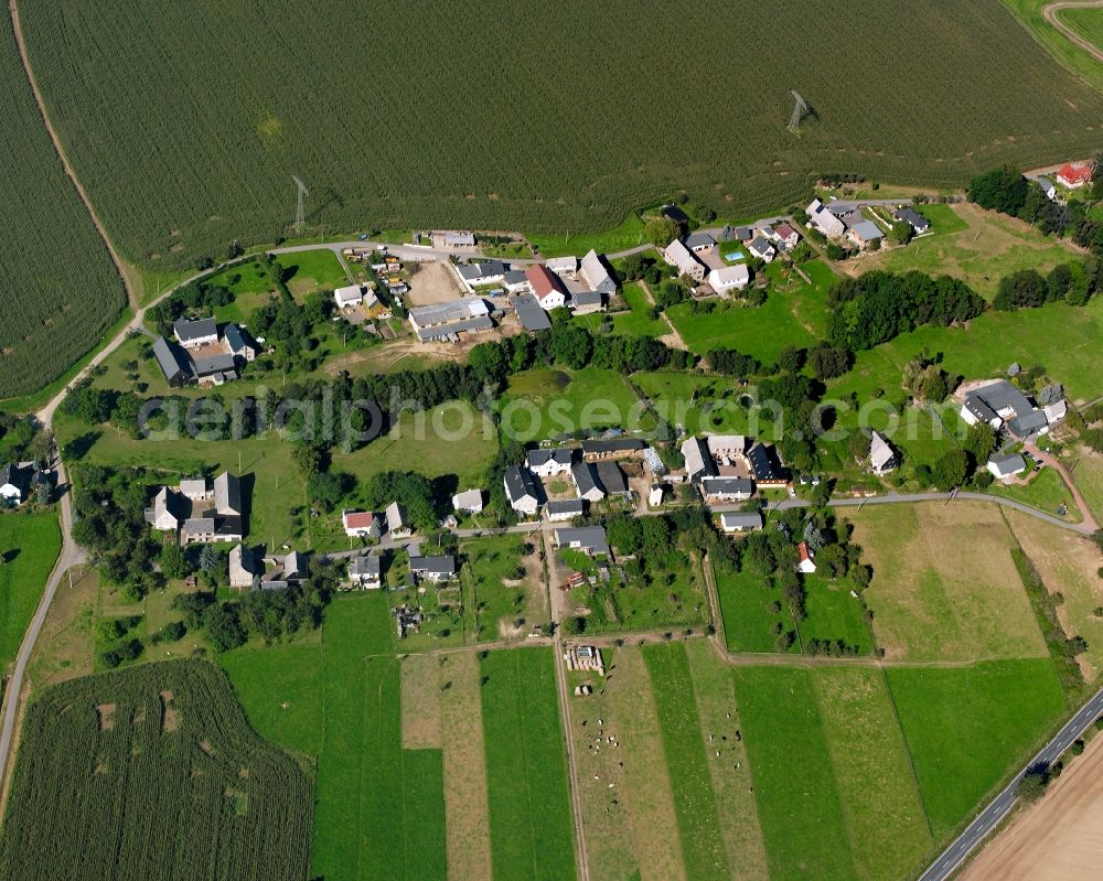 Aerial photograph Falkenau - Agricultural land and field boundaries surround the settlement area of the village in Falkenau in the state Saxony, Germany