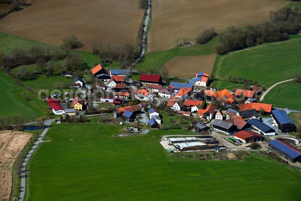 Feldbuch from the bird's eye view: Agricultural land and field boundaries surround the settlement area of the village in Feldbuch in the state Bavaria, Germany