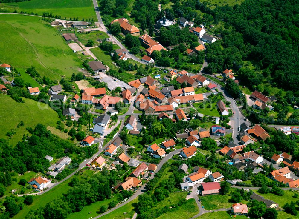 Aerial image Finkenbach-Gersweiler - Agricultural land and field boundaries surround the settlement area of the village in Finkenbach-Gersweiler in the state Rhineland-Palatinate, Germany