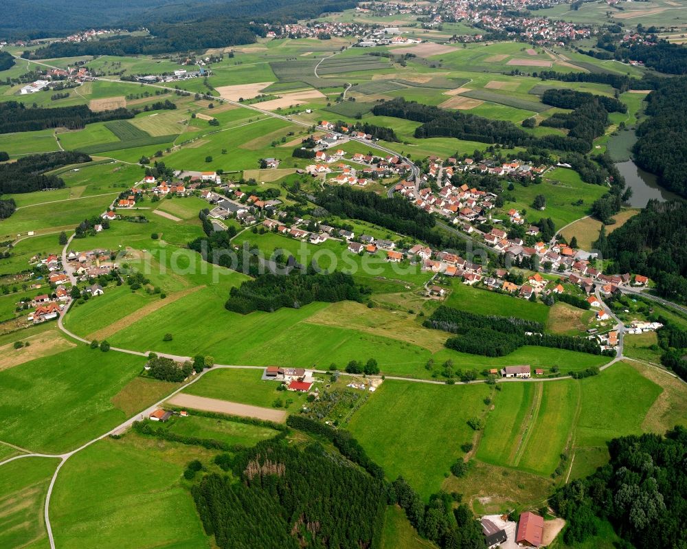 Finsterrot from the bird's eye view: Agricultural land and field boundaries surround the settlement area of the village in Finsterrot in the state Baden-Wuerttemberg, Germany