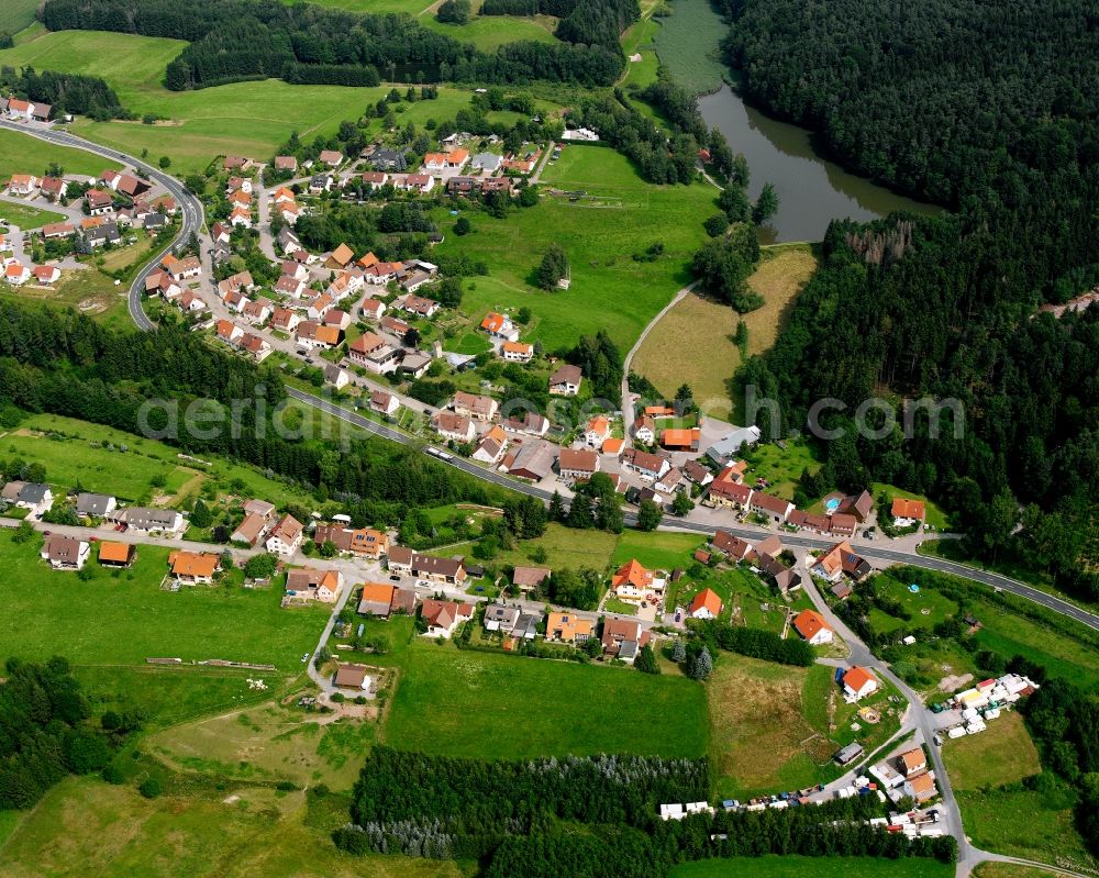 Aerial image Finsterrot - Agricultural land and field boundaries surround the settlement area of the village in Finsterrot in the state Baden-Wuerttemberg, Germany