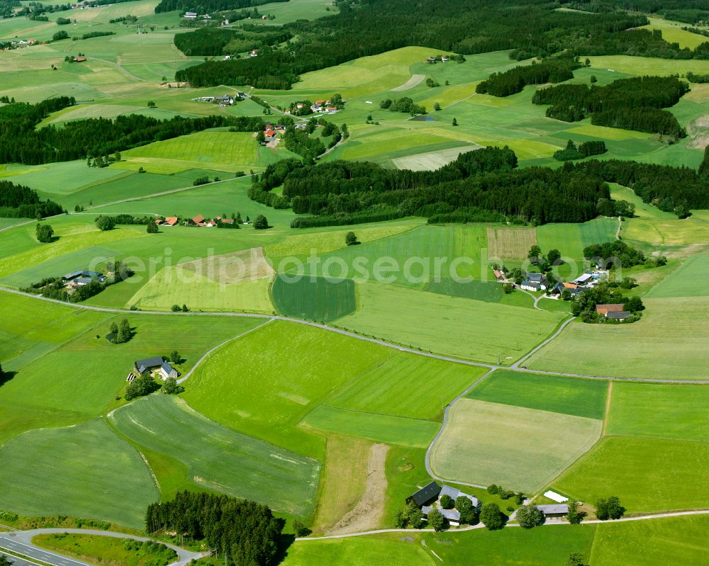 Aerial image Fleisnitz - Agricultural land and field boundaries surround the settlement area of the village in Fleisnitz in the state Bavaria, Germany