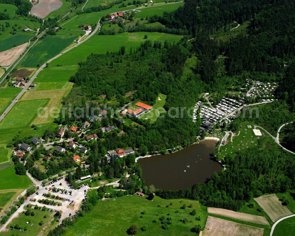 Fornsbach from above - Agricultural land and field boundaries surround the settlement area of the village in Fornsbach in the state Baden-Wuerttemberg, Germany