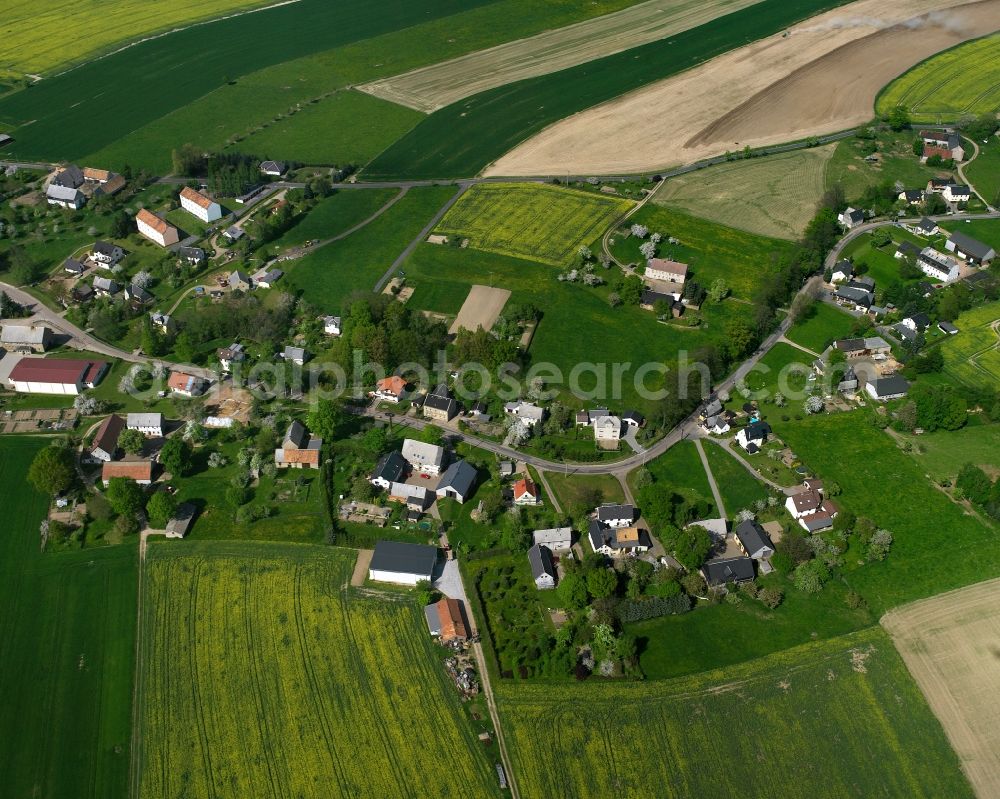 Frankenau from the bird's eye view: Agricultural land and field boundaries surround the settlement area of the village in Frankenau in the state Saxony, Germany