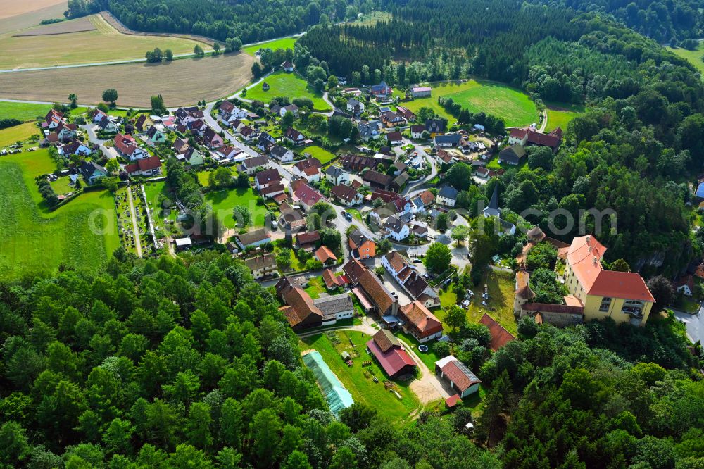 Freienfels from the bird's eye view: Agricultural land and field boundaries surround the settlement area of the village in Freienfels in the state Bavaria, Germany