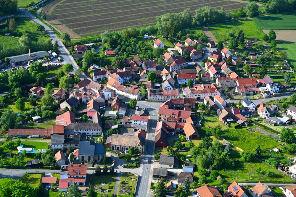 Aerial photograph Freienorla - Agricultural land and field boundaries surround the settlement area of the village in Freienorla in the state Thuringia, Germany